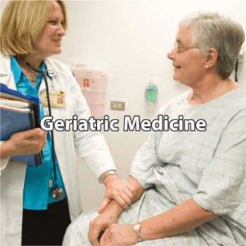 Doctor with Geriatric Patient in Examination Room